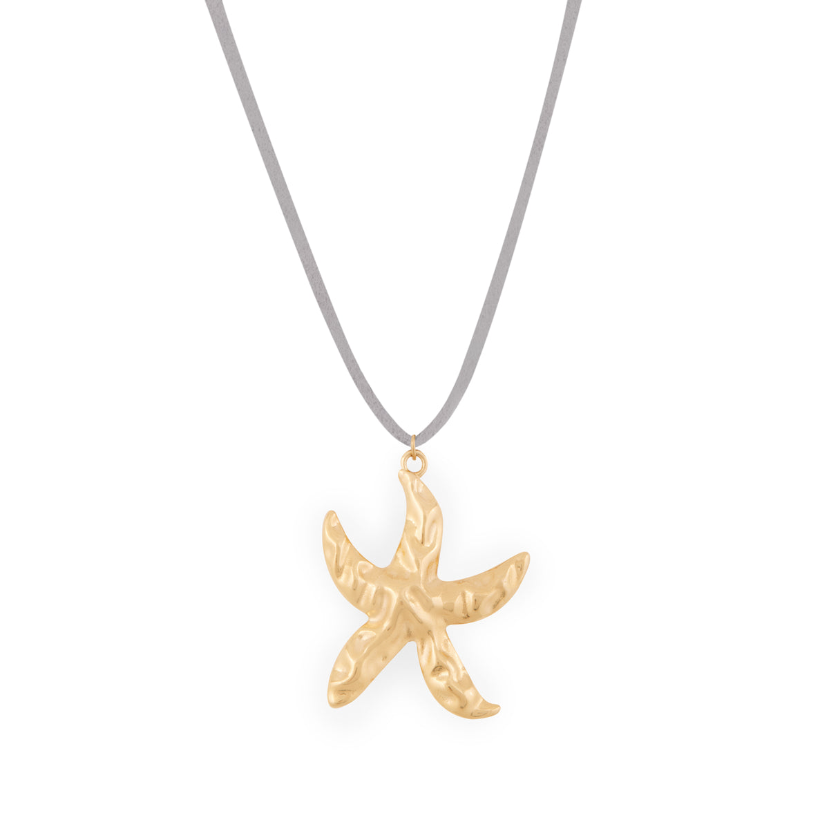 A gold-colored starfish pendant on a faux suede cord necklace. Collier Bali - Or