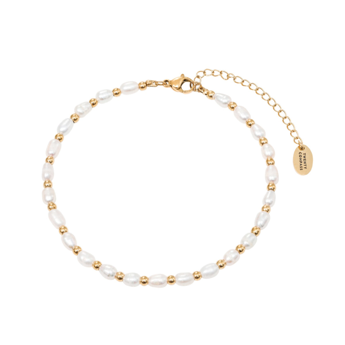 A gold-colored anklet featuring white pearls and gold beads, with a gold clasp. Lagoon Pearl Anklet - Gold