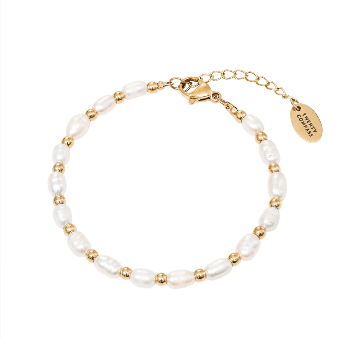 A gold-colored bracelet featuring white pearls and gold beads, with a gold clasp. Lagoon Pearl Bracelet - Gold