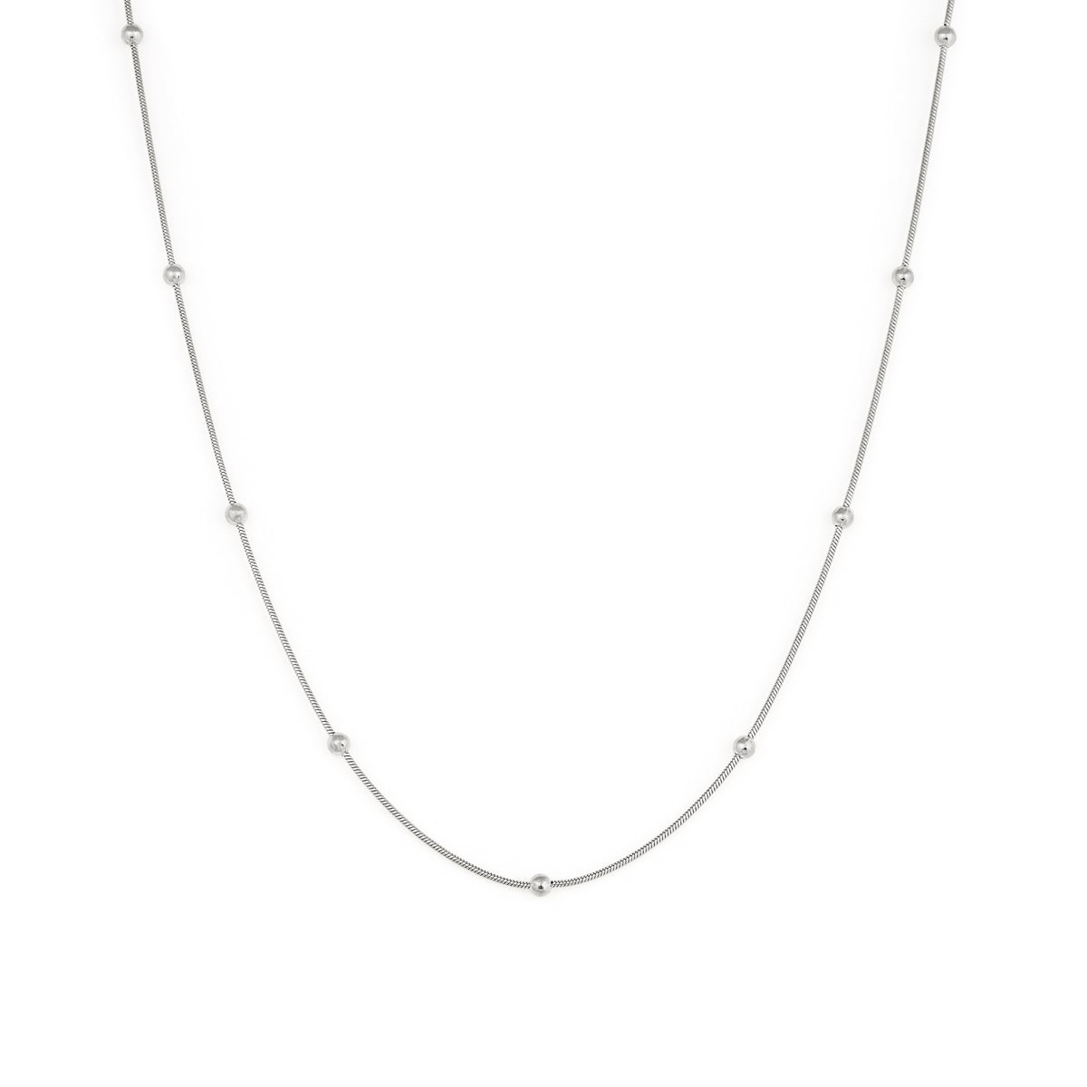A silver necklace with a chain link design and small spherical embellishments evenly spaced along the length. Collier Aura - Argent