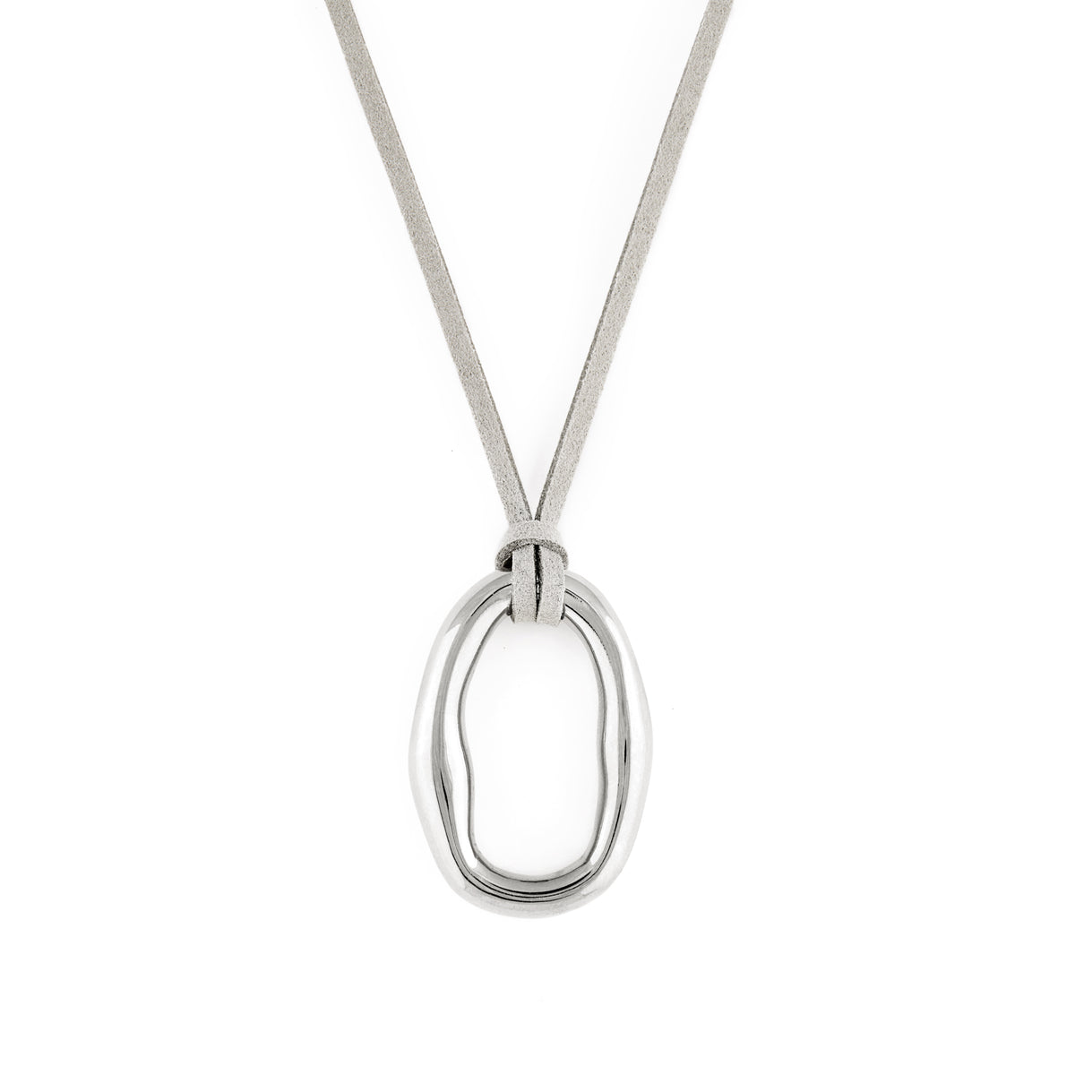 A silver-colored necklace with an organic shaped pendant and a soft vegan suede cord. Dolce Necklace - Silver