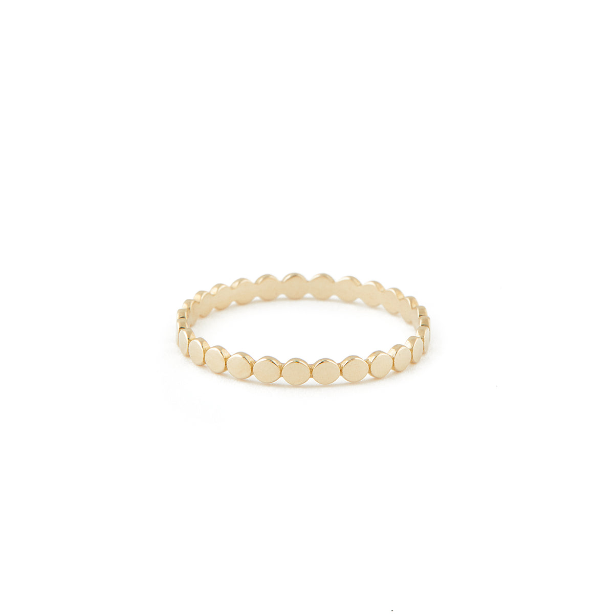 A gold ring with a uniform dotted finish. 10k Dotted Ring