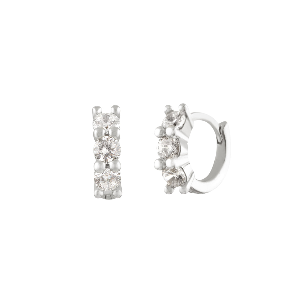 A pair of silver hoop earrings with cubic zirconia embellishments, designed in a minimalist style. Anneaux Éclat - Argent
