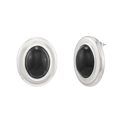 Pair of earrings with black center and silver outer ring on a white background
