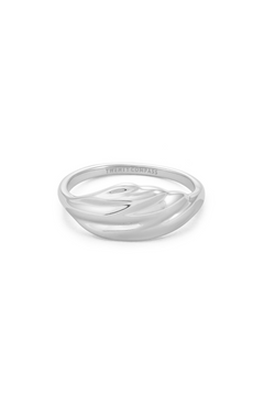 Silver ring with a fluid, wave-like design across the band, on a white background
