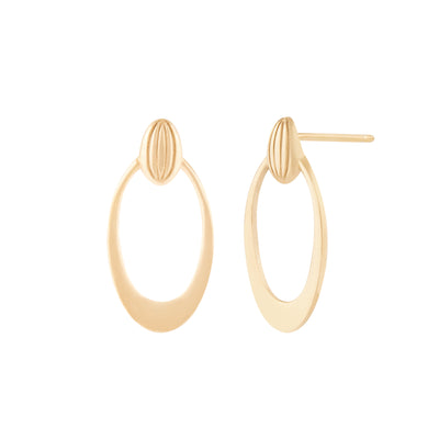 A pair of gold stud earrings with a vintage inspired design consisting of a textured top and a smooth, elongated oval drop.