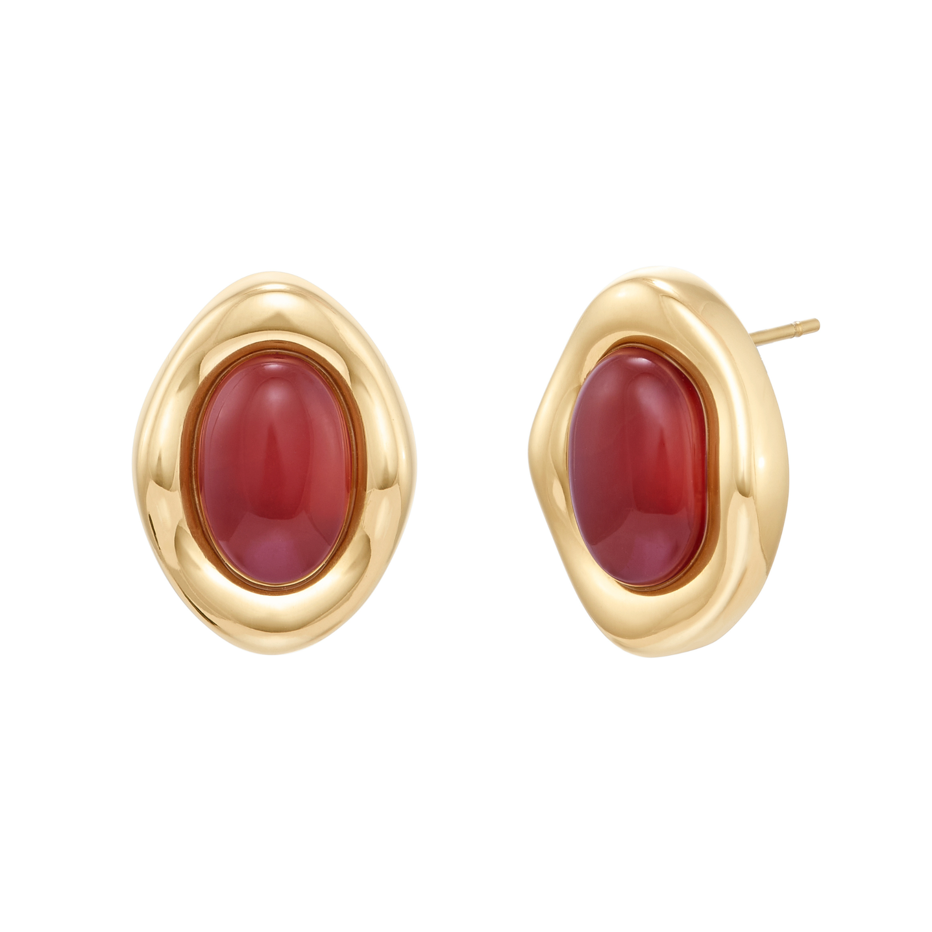 Gold earrings with red stones on a white background
