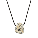Necklace with a dalmatian jasper stone pendant on a white background