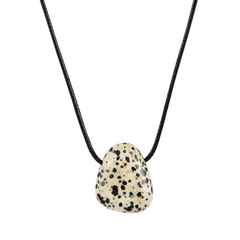 Necklace with a dalmatian jasper stone pendant on a white background