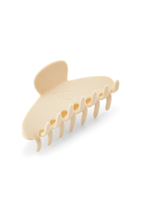 Beige hair clip on a white background 🎁 Crème Hair Clip (100% off)