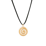 A gold-colored spiral pendant necklace on a black faux suede cord.
