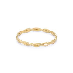 Thin gold ring with an interwoven, braided design around the band