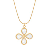 A gold-colored necklace with a flower-shaped pendant adorned with faux pearl detailing on a simple chain.