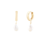 A pair of gold hoop earrings with freshwater pearl pendants.