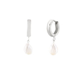 A pair of silver hoop earrings with freshwater pearl pendants.