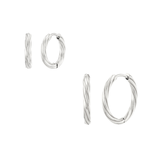 Set of silver hoop earrings on a white background