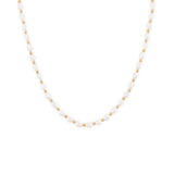 A gold-colored necklace featuring freshwater pearls and small gold beads, designed to rest high on the neckline.