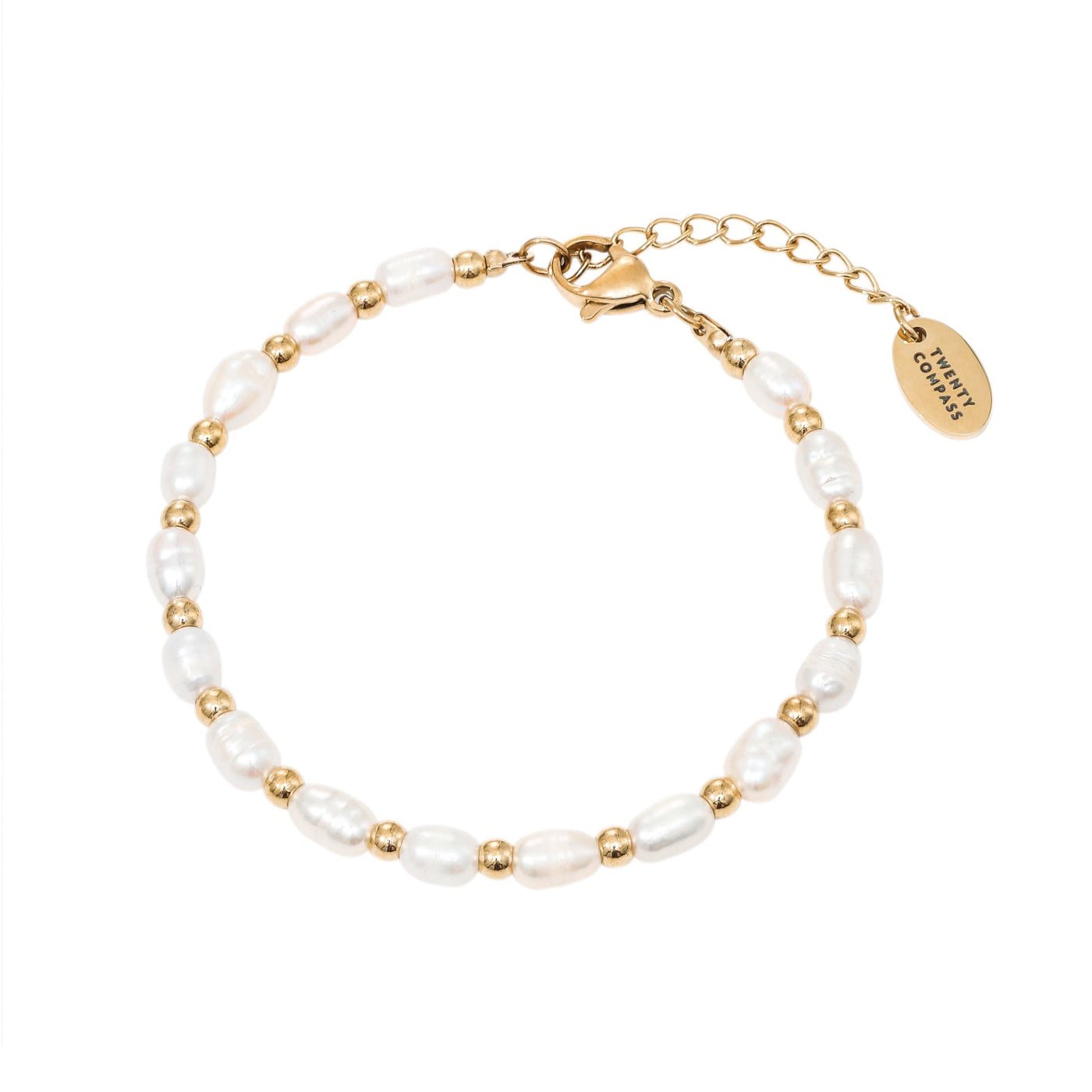 A gold-colored bracelet featuring white pearls and gold beads, with a gold clasp. Bracelet de Perles Lagoon - Or