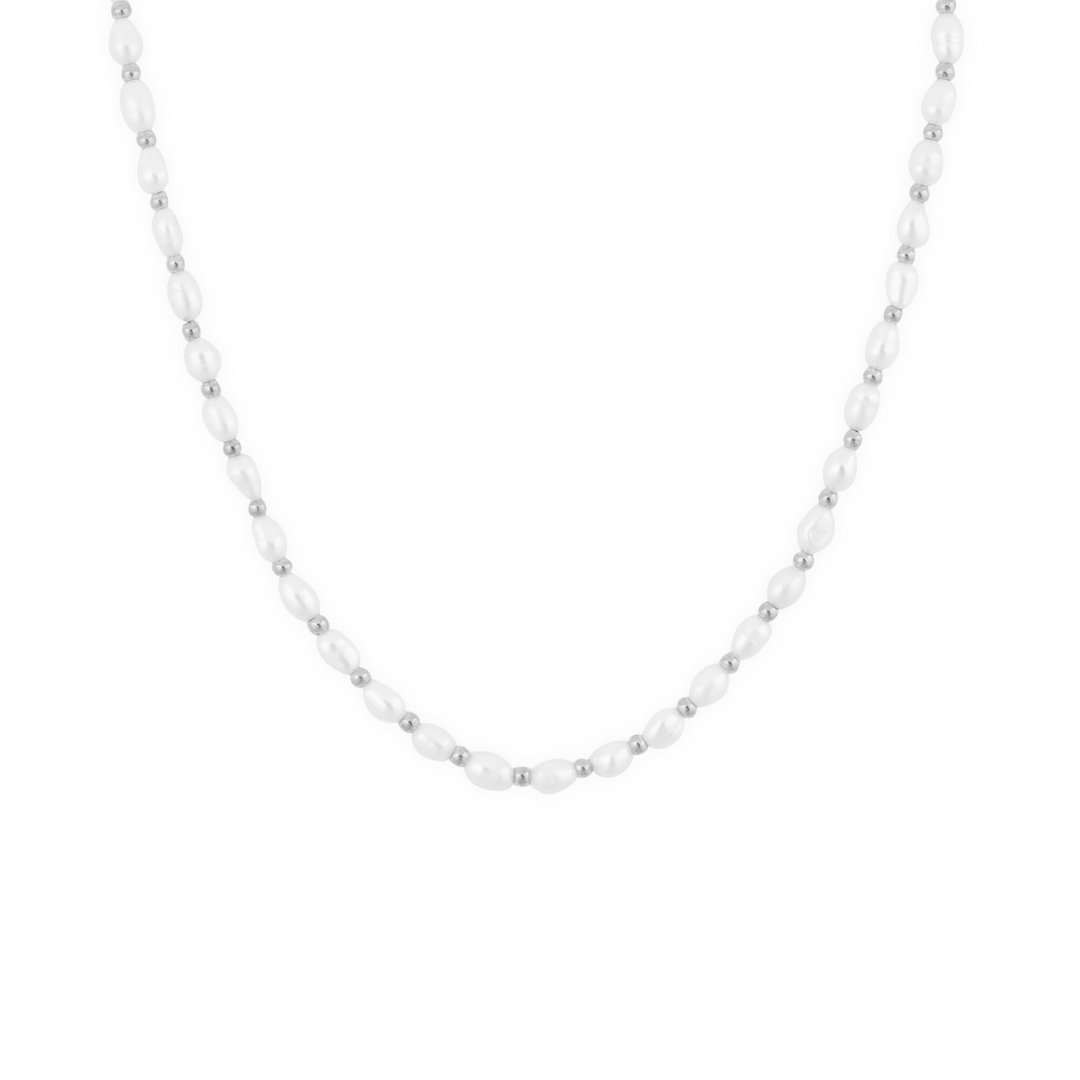A silver-colored necklace with freshwater pearls and small beads, designed to rest high on the neckline.