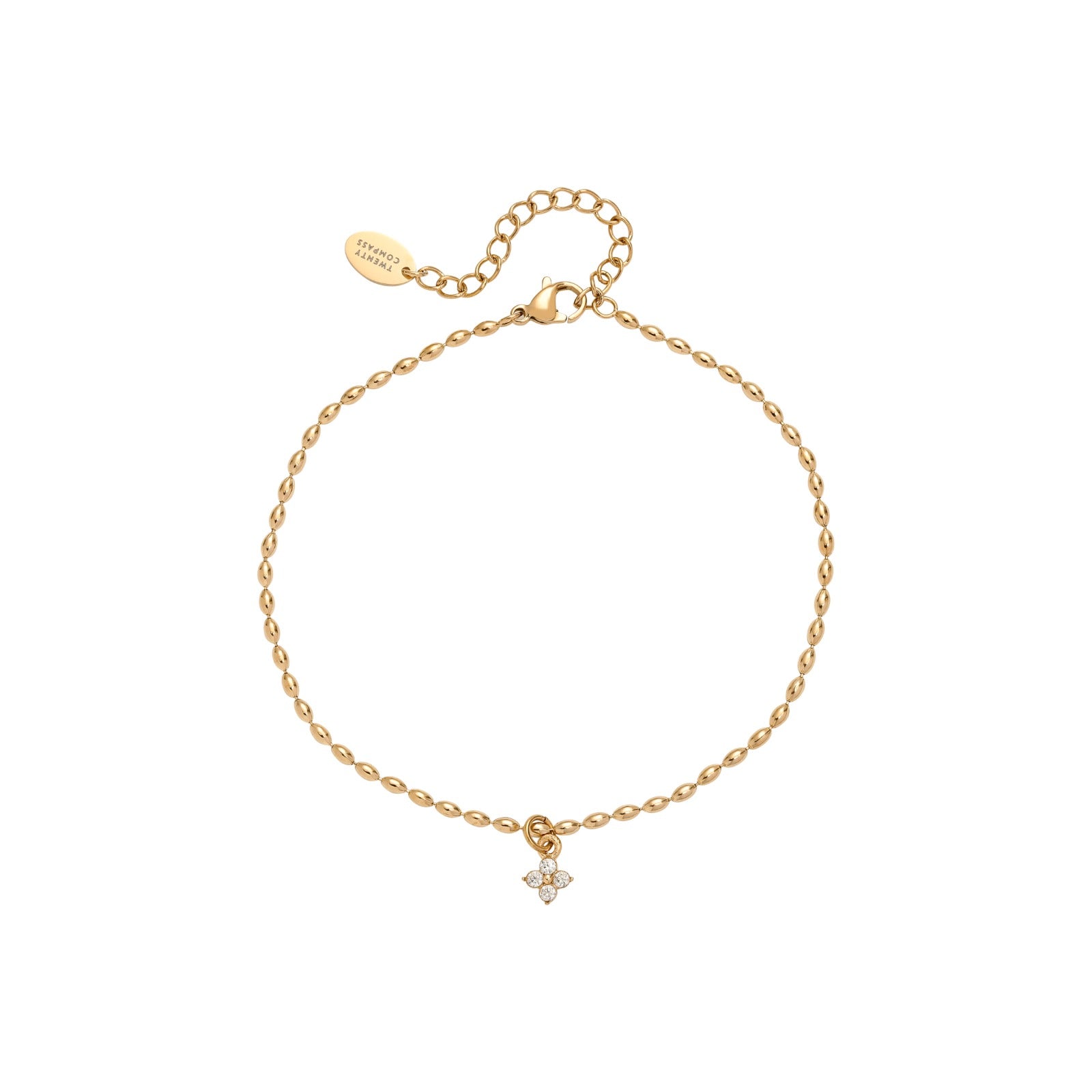 Gold anklet with a small floral charm on a white background