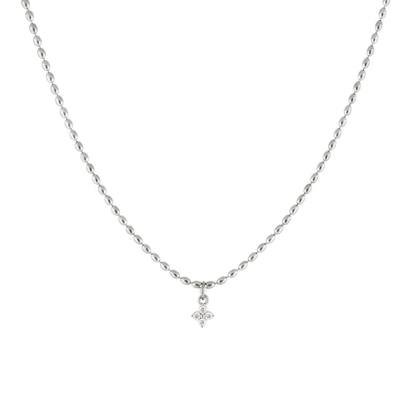 A silver necklace with dainty oval-shaped beads and a cubic zirconia pendant. Collier Merveilles - Argent