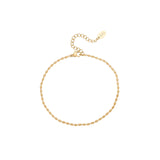 A gold-colored bracelet with a delicate bead chain design, displayed against a white background.