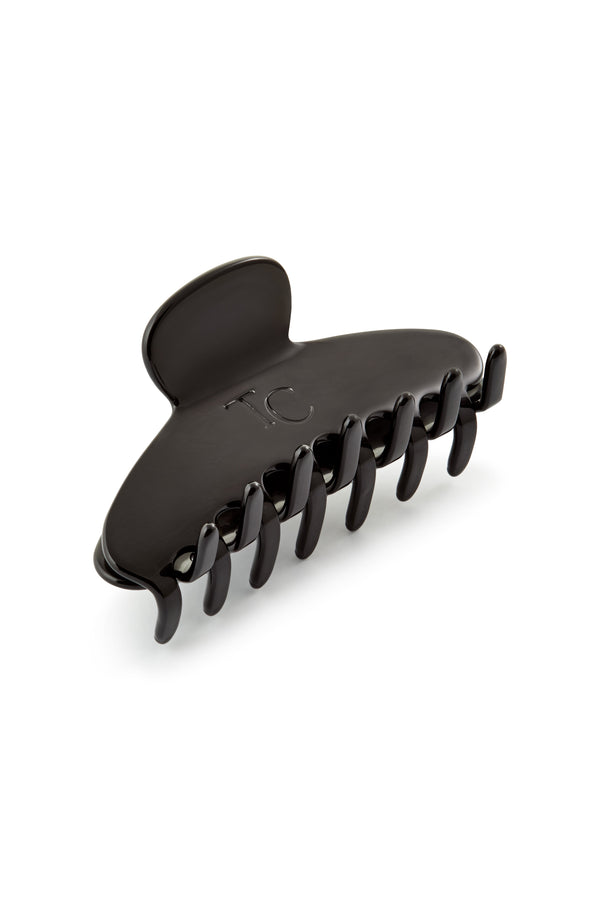 Black hair clip on a white background 🎁 Noir Hair Clip (100% off)
