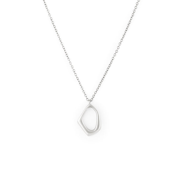 A silver necklace with a dainty organic shaped pendant on a delicate chain. Nova Necklace - Silver