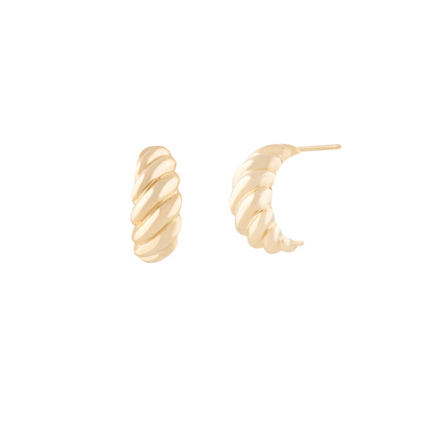 A pair of croissant-shaped, 10 karat gold earrings with a stud backing. Parisienne Studs - 10 Karat Gold