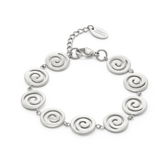 Silver bracelet with spiral designs on a white background