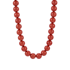 Red beaded necklace on a white background