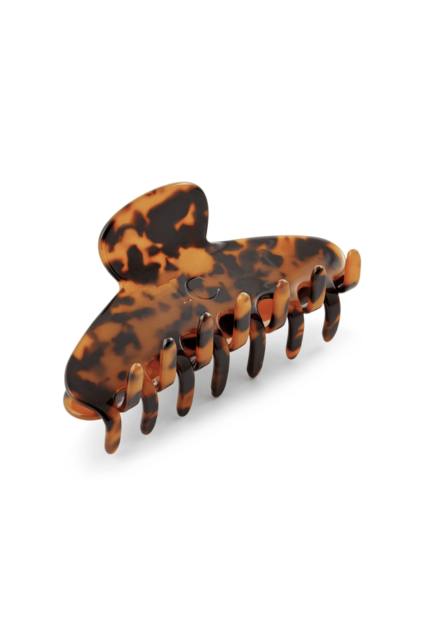 Tortoiseshell patterned hair clip on a white background 🎁 Tortoise Hair Clip (100% off)