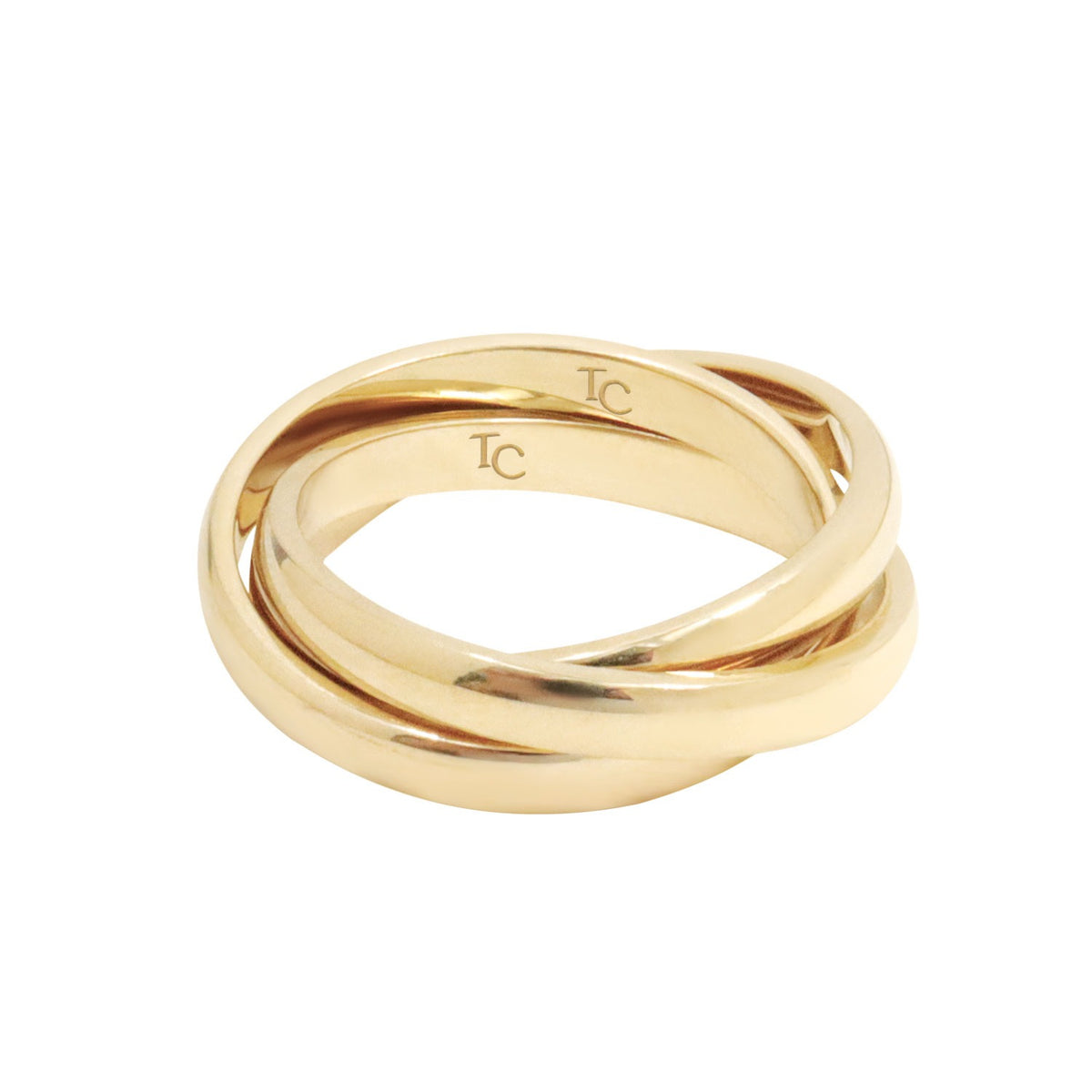 Gold Triple Ring: Three interlocking silver bands  Bague Triple - Or