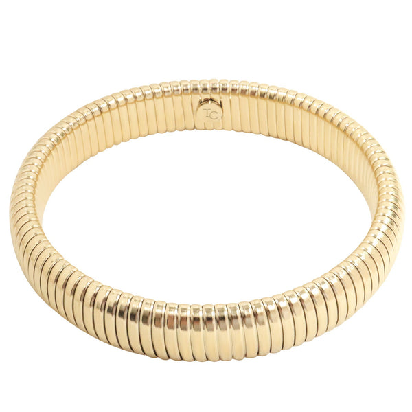 Gold Riba Bracelet: A thick, gold-toned bracelet with a ribbed, flexible design Bracelet Riba - Or